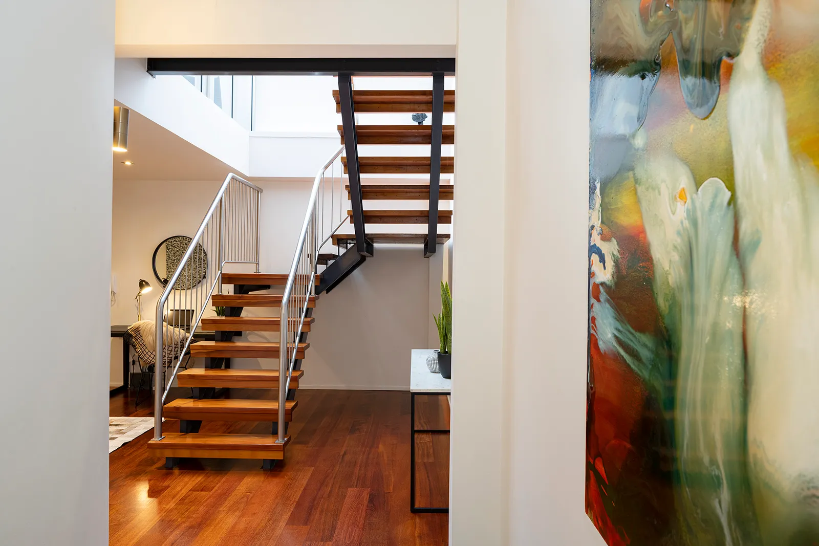 Auckland home interior staircase - NZ property ownership